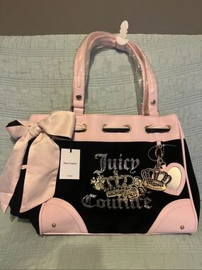 Bought in the US Juicy Couture Black and Pink Bow Accent Satchel with Charm